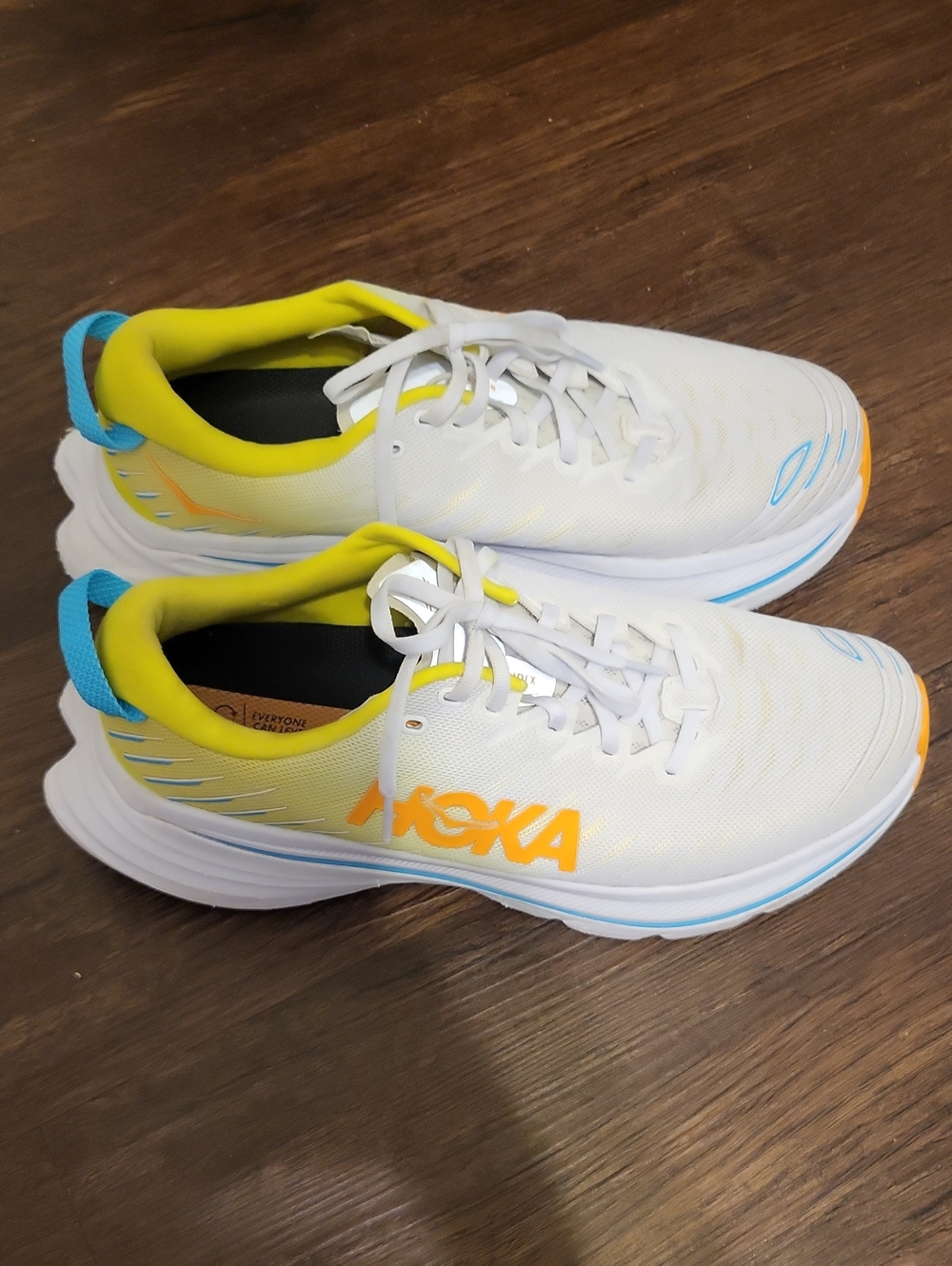 Hoka Men's White Running Shoes with Yellow & Blue Accents